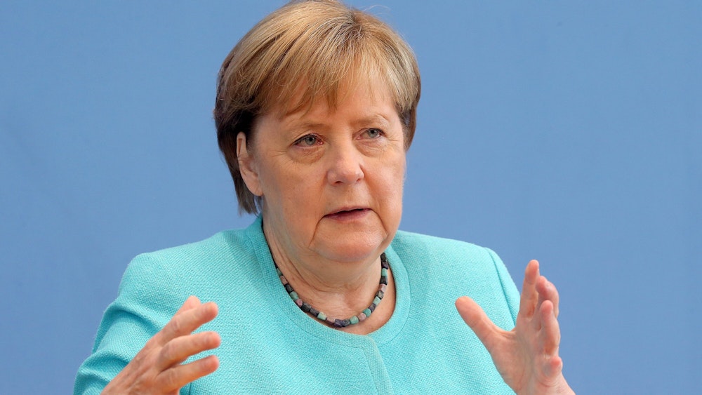 Bundeskanzlerin Angela Merkel (CDU) sitzt in der Bundespressekonferenz und stellt sich den Fragen der Hauptstadt-Journalisten.