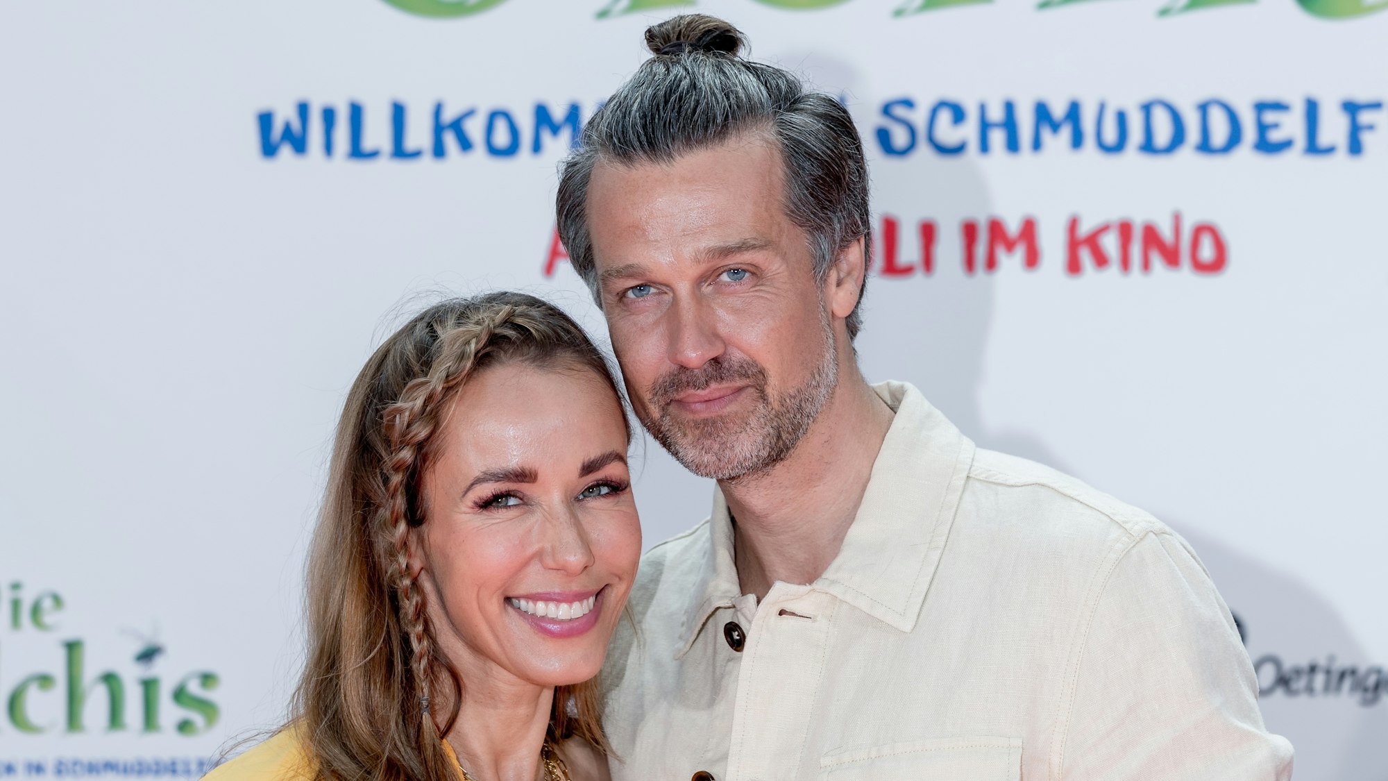 Die Sprecher Annemarie und Wayne Carpendale stehen bei der Deutschland-Premiere des Films „Die Olchis - Willkommen in Schmuddelfing“ am 18. Juli 2021 auf dem Roten Teppich. +++ dpa-Bildfunk +++