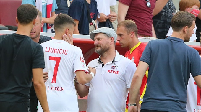 Dejan Ljubicic und Steffen Baumgart vom 1. FC Köln nach der Partie gegen Hertha BSC.