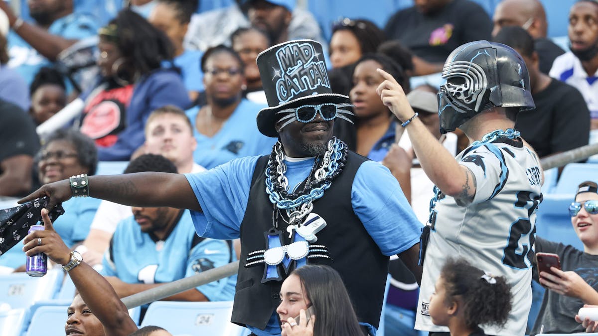 Carolina Panthers fans enjoy Fan Fest at the NFL football team's training camp in Charlotte, N.C., Friday, Aug. 6, 2021. (AP Photo/Nell Redmond)