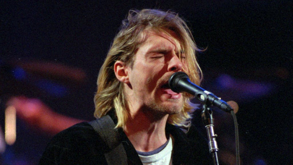 Kurt Cobain tritt mit seiner Band Nirvana im März 1994 auf