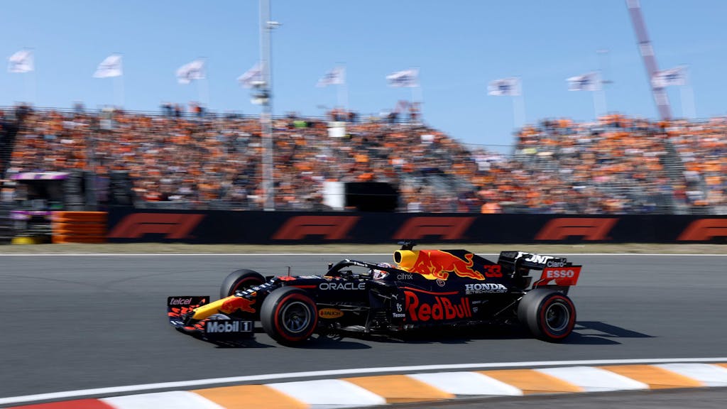Red Bull's Dutch driver Max Verstappen races at the Zandvoort circuit during the qualifying session of the Netherlands' Formula One Grand Prix in Zandvoort on September 4, 2021. (Photo by Kenzo Tribouillard / AFP)