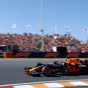 Red Bull's Dutch driver Max Verstappen races at the Zandvoort circuit during the qualifying session of the Netherlands' Formula One Grand Prix in Zandvoort on September 4, 2021. (Photo by Kenzo Tribouillard / AFP)