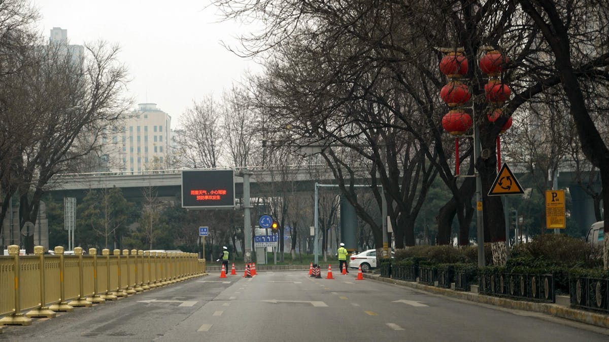 This picture shows an empty road in Xi'an in China's northern Shaanxi province on December 31, 2021, amid a Covid-19 coronavirus lockdown. (Photo by AFP) / China OUT