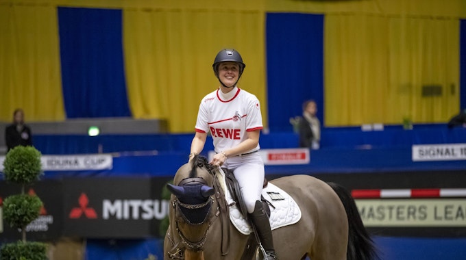 Gina Maria Schumacher auf ihrem Pferd beim Dortmunder Signal Iduna Cup.