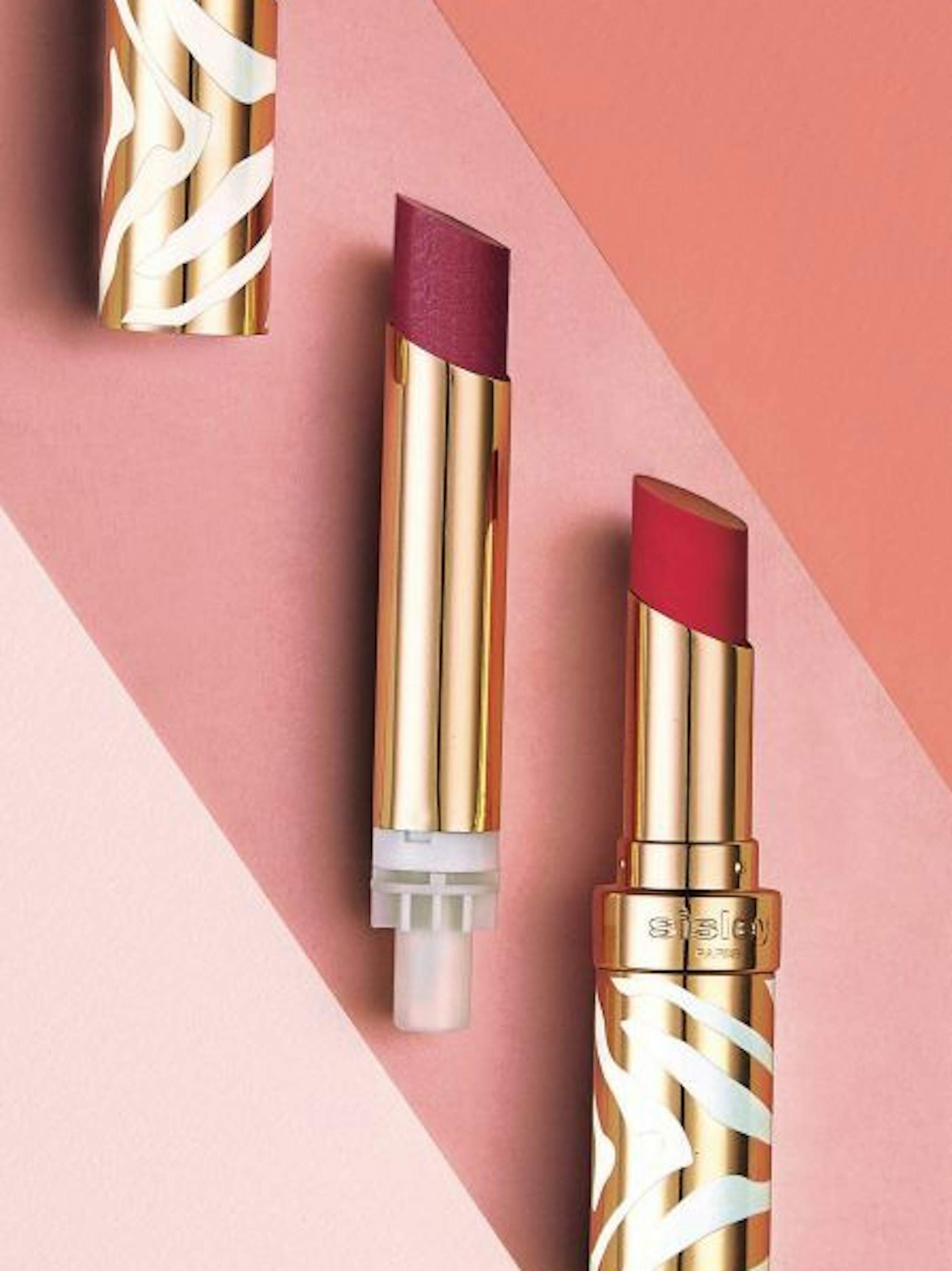 Sisley Le Phyto Rouge Shine Lippenstift in zwei Farben, ein dunkler Pink- und ein Rotton.