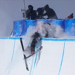 Britain's Gus Kenworthy crashes during the men's halfpipe finals at the 2022 Winter Olympics, Saturday, Feb. 19, 2022, in Zhangjiakou, China. (AP Photo/Gregory Bull)
