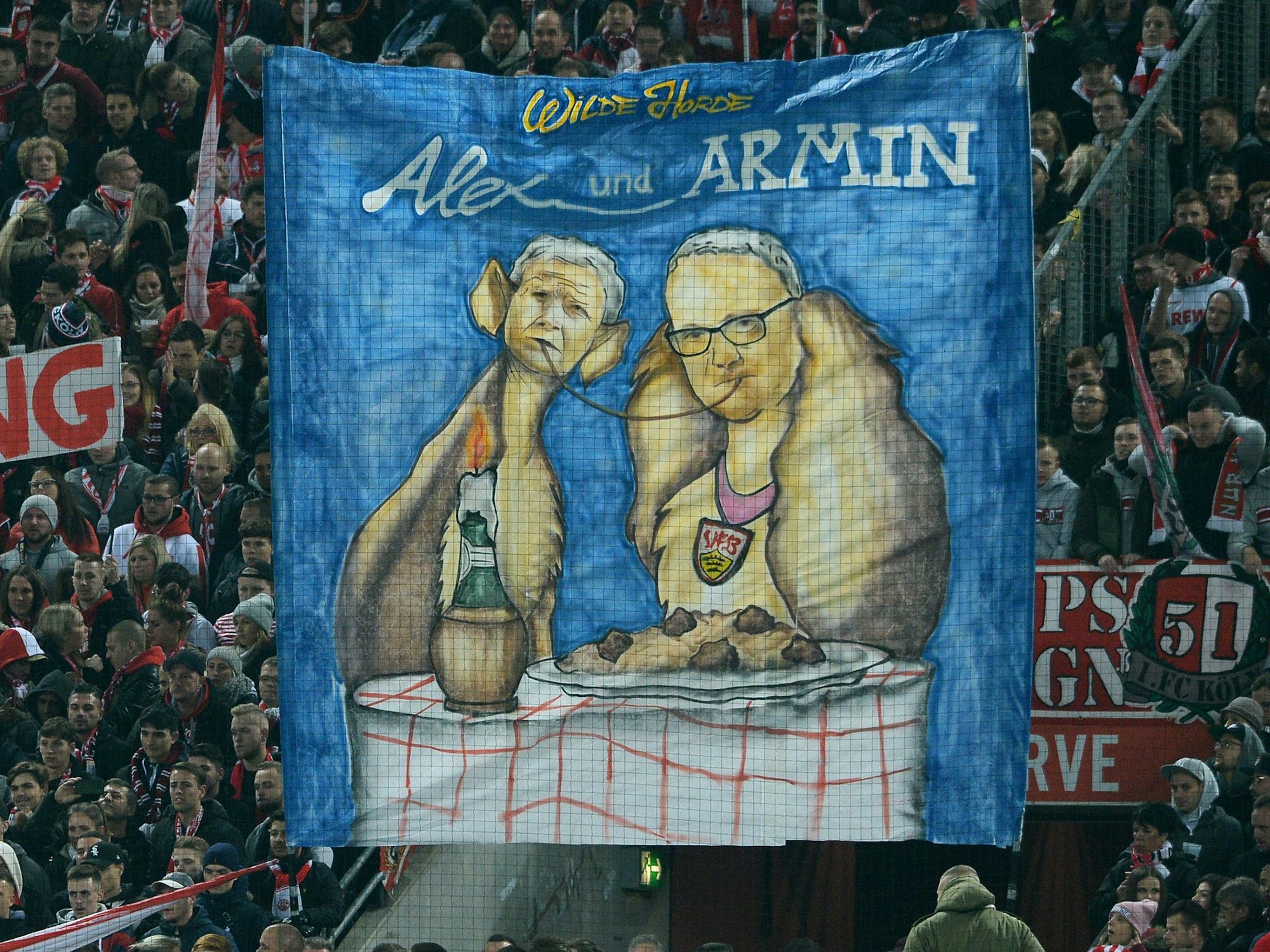Armin Veh und Alexander Wehrle sind auf einem FC-Plakat Susi und Strolch.