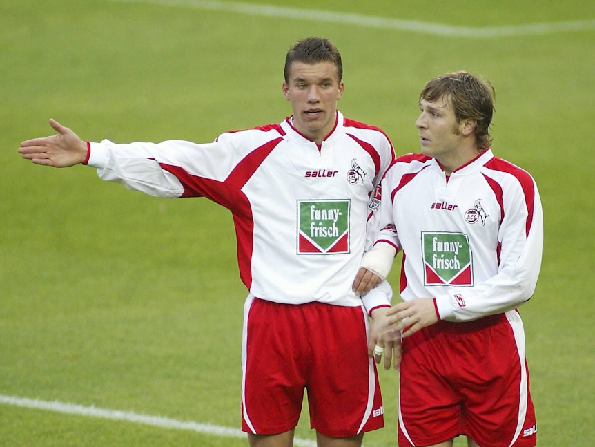 Lukas Podolski und Andrej Voronin.