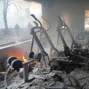 A view of smoke from inside a damaged gym following shelling in Kyiv, Ukraine, Wednesday, March 2, 2022. Russian forces have escalated their attacks on crowded cities in what Ukraine's leader called a blatant campaign of terror. (AP Photo/Efrem Lukatsky)