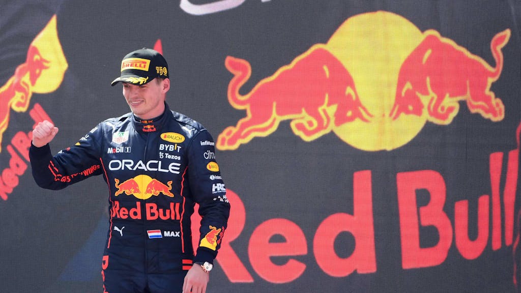 Red Bull's Dutch driver Max Verstappen celebrates on the podium after winning the Spanish Formula One Grand Prix at the Circuit de Catalunya on May 21, 2022 in Montmelo, on the outskirts of Barcelona. (Photo by LLUIS GENE / AFP)