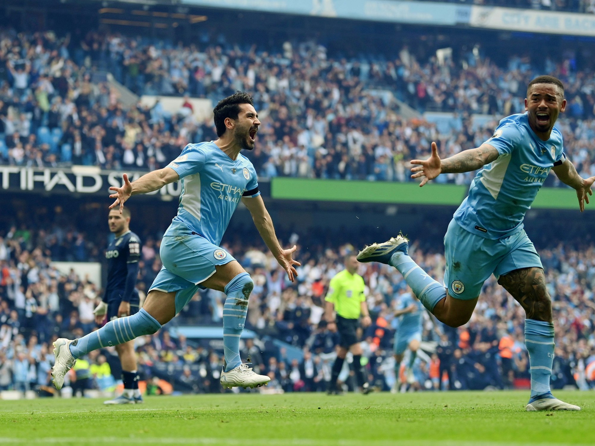 MANCHESTER, ENGLAND - MAY 22: Ilkay Guendogan of Manchester City celebrates after scoring their team's third goal during the Premier League match between Manchester City and Aston Villa at Etihad Stadium on May 22, 2022 in Manchester, England. (Photo by Michael Regan/Getty Images)