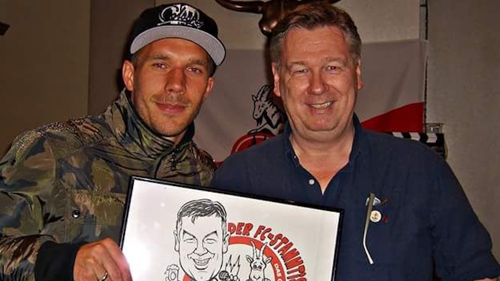 Lukas Podolski (l.) und Moderator Ralf Friedrichs 2016 beim FC-Stammtisch.
