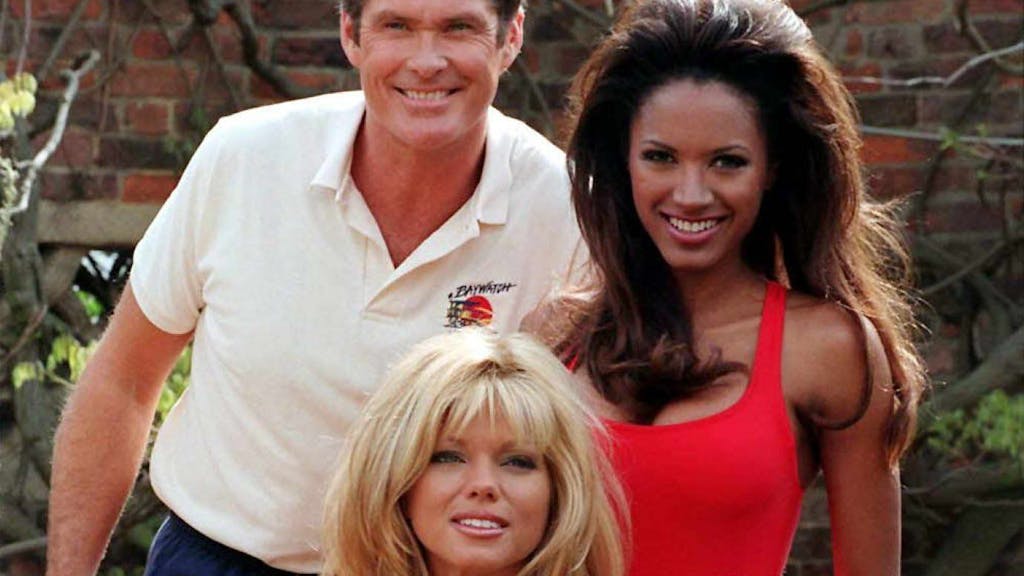 Picture dated 14 April 1997 of David Hasselhoff (L) and co-stars Tracy Bingham (R) and Donna D'Errico (front) of the TV series Baywatch during a promotion photocall in London.&nbsp;