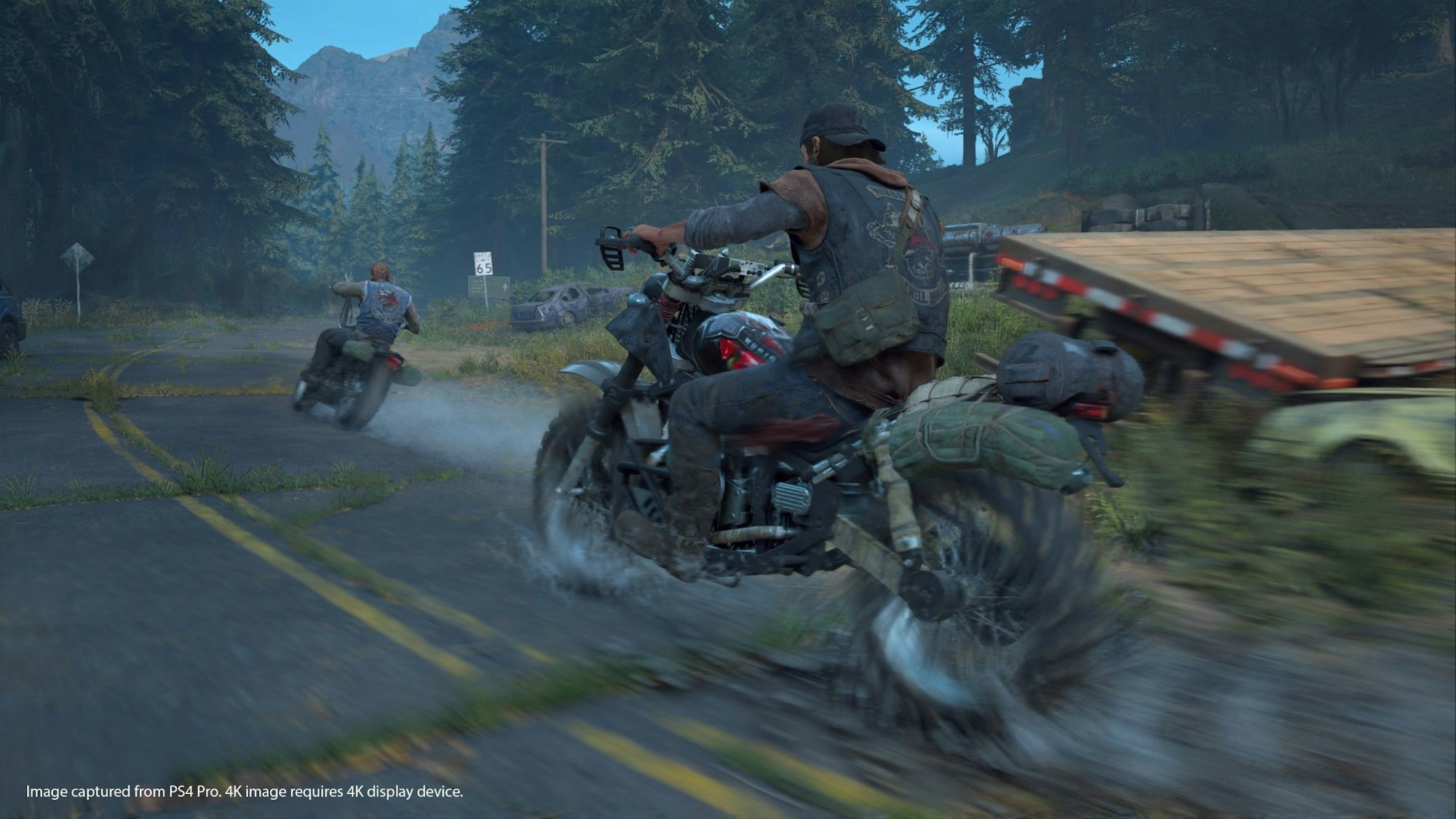In „Days Gone“ erkunden Spiele die offene Welt mit einem schnellen Bike.