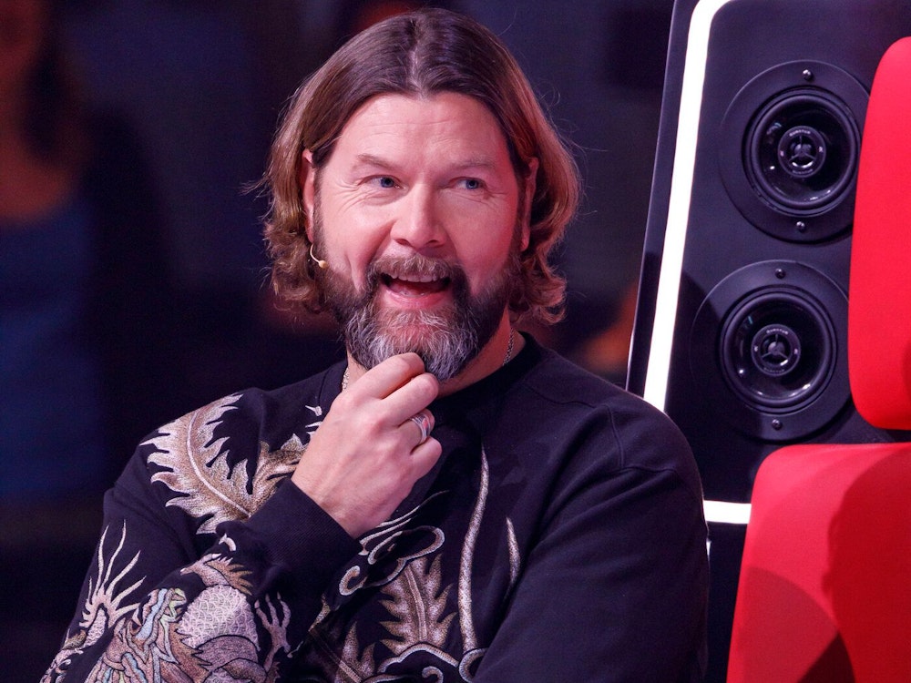 Rea Garvey lacht bei „The Voice of Germany“.