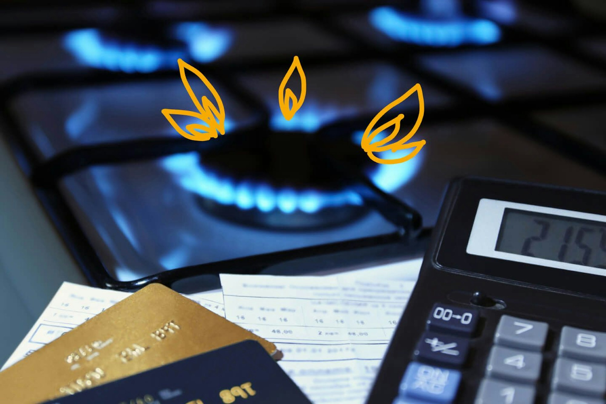 Es ist eine Gasplatte, ein Ausschnitt eines Taschenrechners und Bankkarten zu sehen, welche den hohen Gas Preisanstieg deutlich machen sollen.