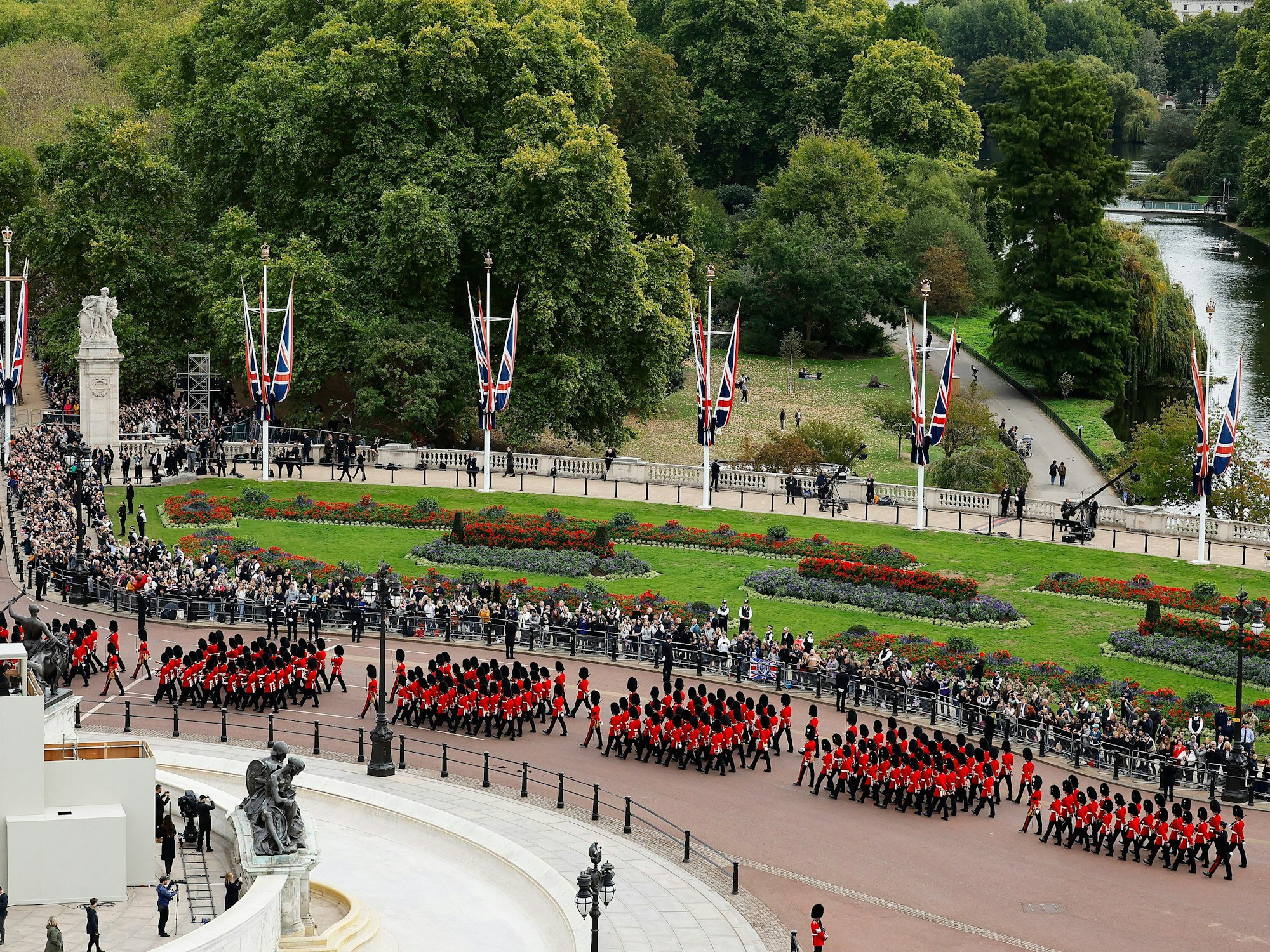 Coldstream Guards proceed down The Mall ahead of The State Funeral of Queen Elizabeth II, in London, Monday, Sept. 19, 2022. (Chip Somodevilla/Pool Photo via AP)
