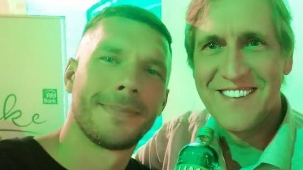 Lukas Podolski mit Cornel Wachter