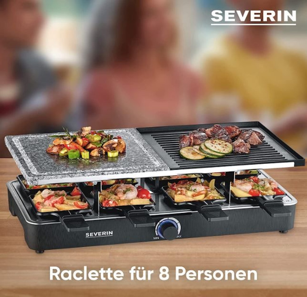 Der Severin Raclette-Grill mit Essen befüllt.