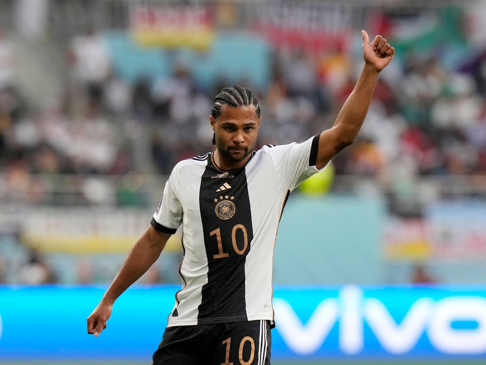 Germany's Serge Gnabry gestures during the World Cup group E soccer match between Germany and Japan, at the Khalifa International Stadium in Doha, Qatar, Wednesday, Nov. 23, 2022. (AP Photo/Luca Bruno)