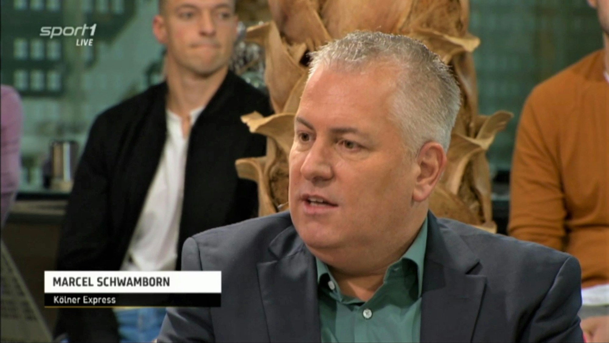 EXPRESS.de-Reporter Marcel Schwamborn sitzt im Doppelpass bei Sport1 und spricht über das WM-Aus und Bundestrainer Hansi Flick.