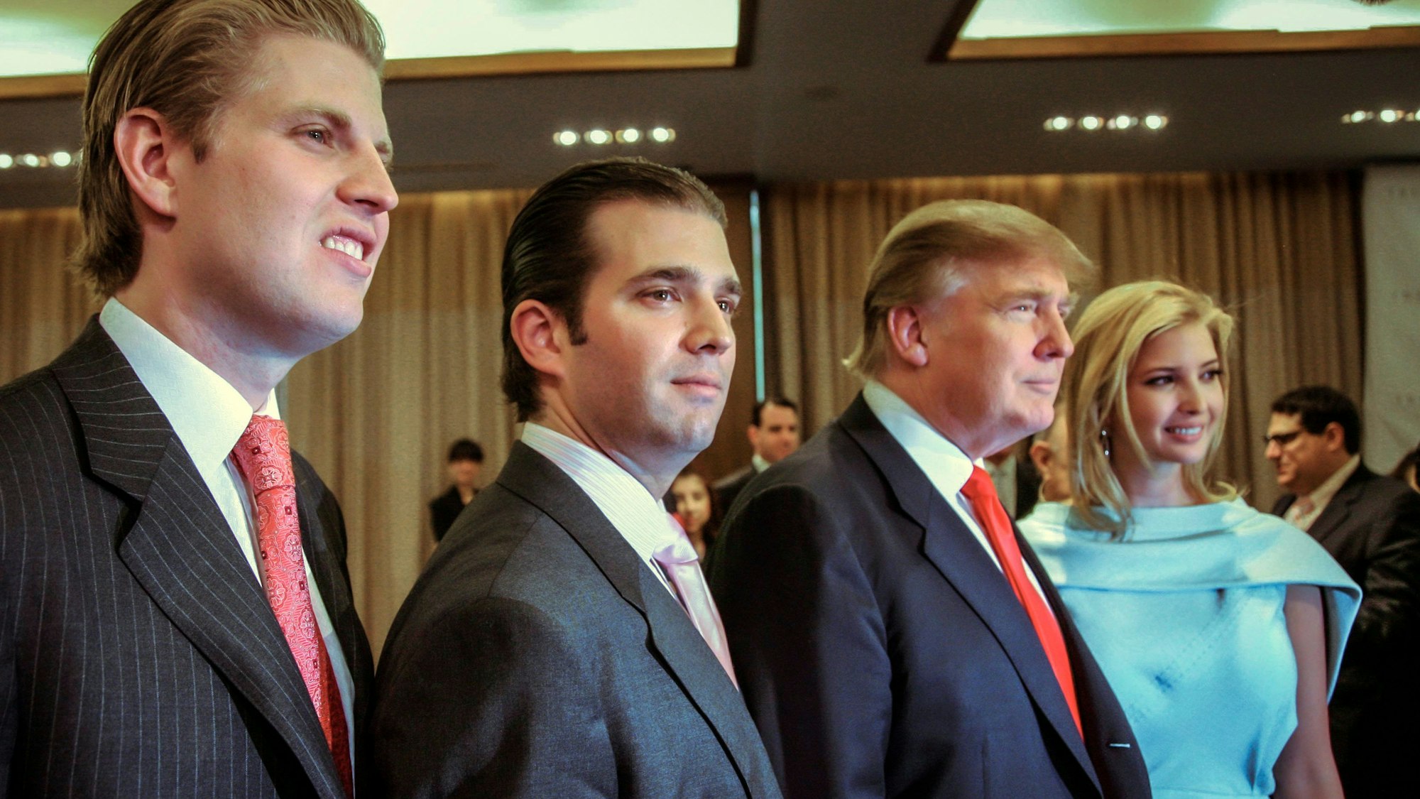 FILE - Donald Trump, chairman and CEO of the Trump Organization, poses with his children, from left, Eric, Donald Jr. and Ivanka, at the opening of the Trump SoHo New York on April 9, 2010. Donald Trump's company has been convicted of tax fraud on Tuesday, Dec. 6, 2022, for a scheme by top executives to avoid paying personal income taxes on perks such as apartments and luxury cars. As punishment, the Trump Organization could be fined up to $1.6 million. (AP Photo/Mark Lennihan, File)