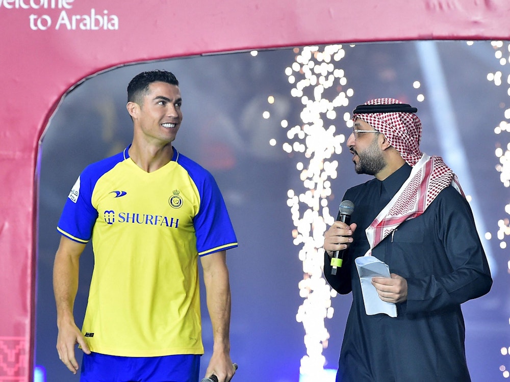 Al-Nassr's new Portuguese forward Cristiano Ronaldo takes the stage during his unveiling at the Mrsool Park Stadium in the Saudi capital Riyadh on January 3, 2023. (Photo by AFP)