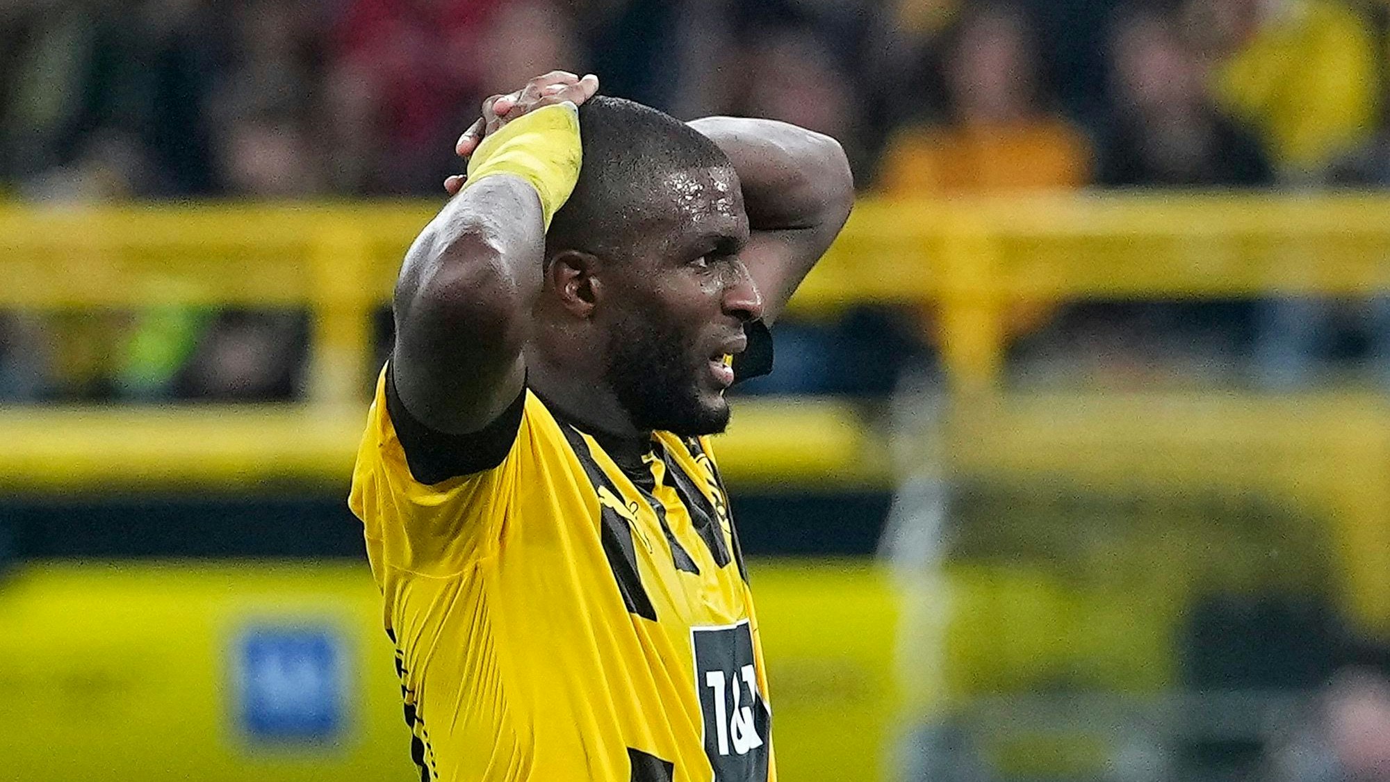 Dortmund's Anthony Modeste reacts after he missed to score during the German Bundesliga soccer match between Borussia Dortmund and TSG Hoffenheim in Dortmund, Germany, Friday, Sept. 2, 2022. (AP Photo/Martin Meissner)