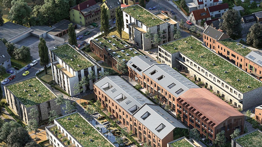 Eine Animation aus der Vogelperspektive zeigt, wie das Projekt einmal aussehen soll: Grüne Dächer und moderne Architektur gepaart mit historischem Ambiente.