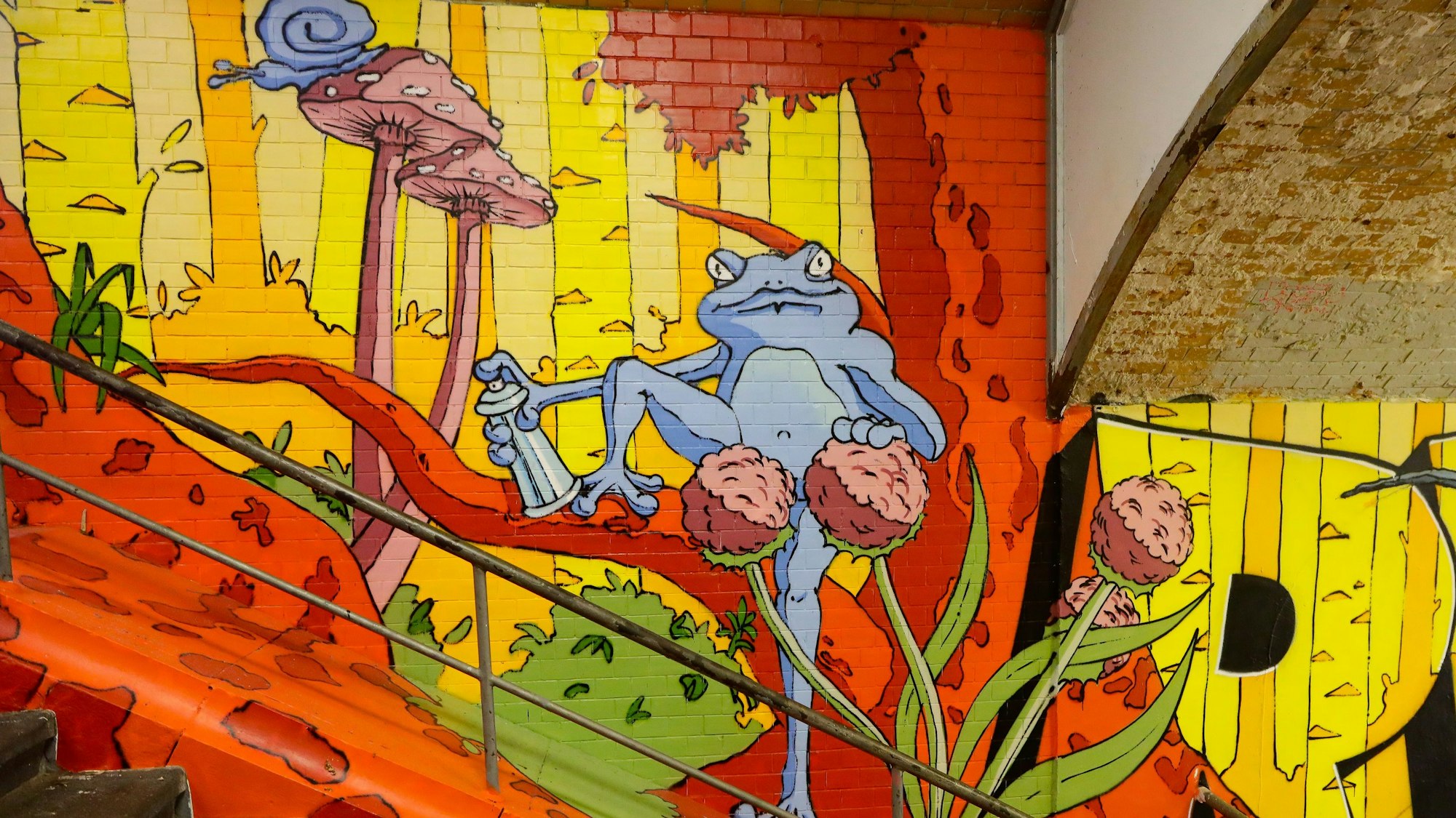 Grafitti an der Treppe mit Frosch