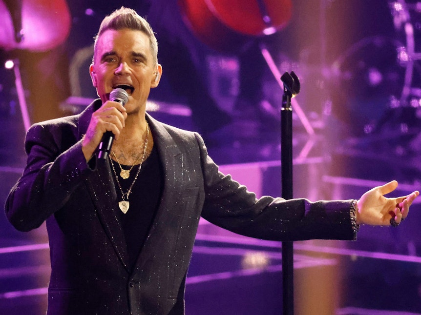 Der britische Popstar Robbie Williams bei einem Auftritt.