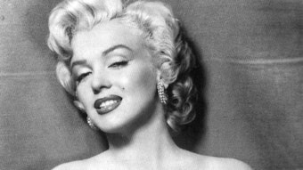 Marilyn Monroe an einer Wand.