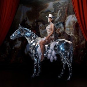 Beyoncé sitzt auf einem Pferd.