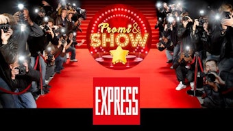 Fotografen am roten Teppich, auf dem das Logo des EXPRESS und von Promi & Show zu sehen sind.