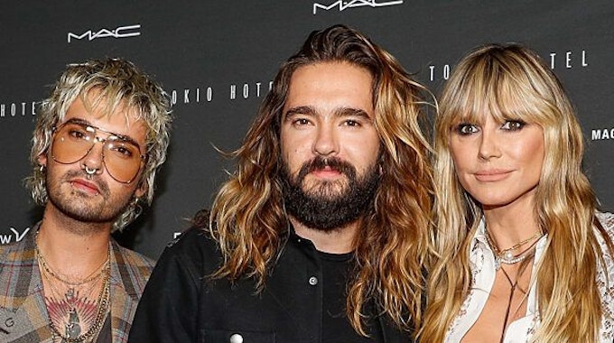 Bill Kaulitz, Tom Kaulitz und Heidi Klum kommen zu einer Veranstaltung rund um die Band Tokio Hotel in Berlin. (