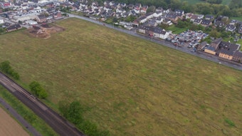 Das Luftbild zeigt die 56 Hektar große Fläche in Hausweiler, wo ein Neubaugebiet entstehen soll.