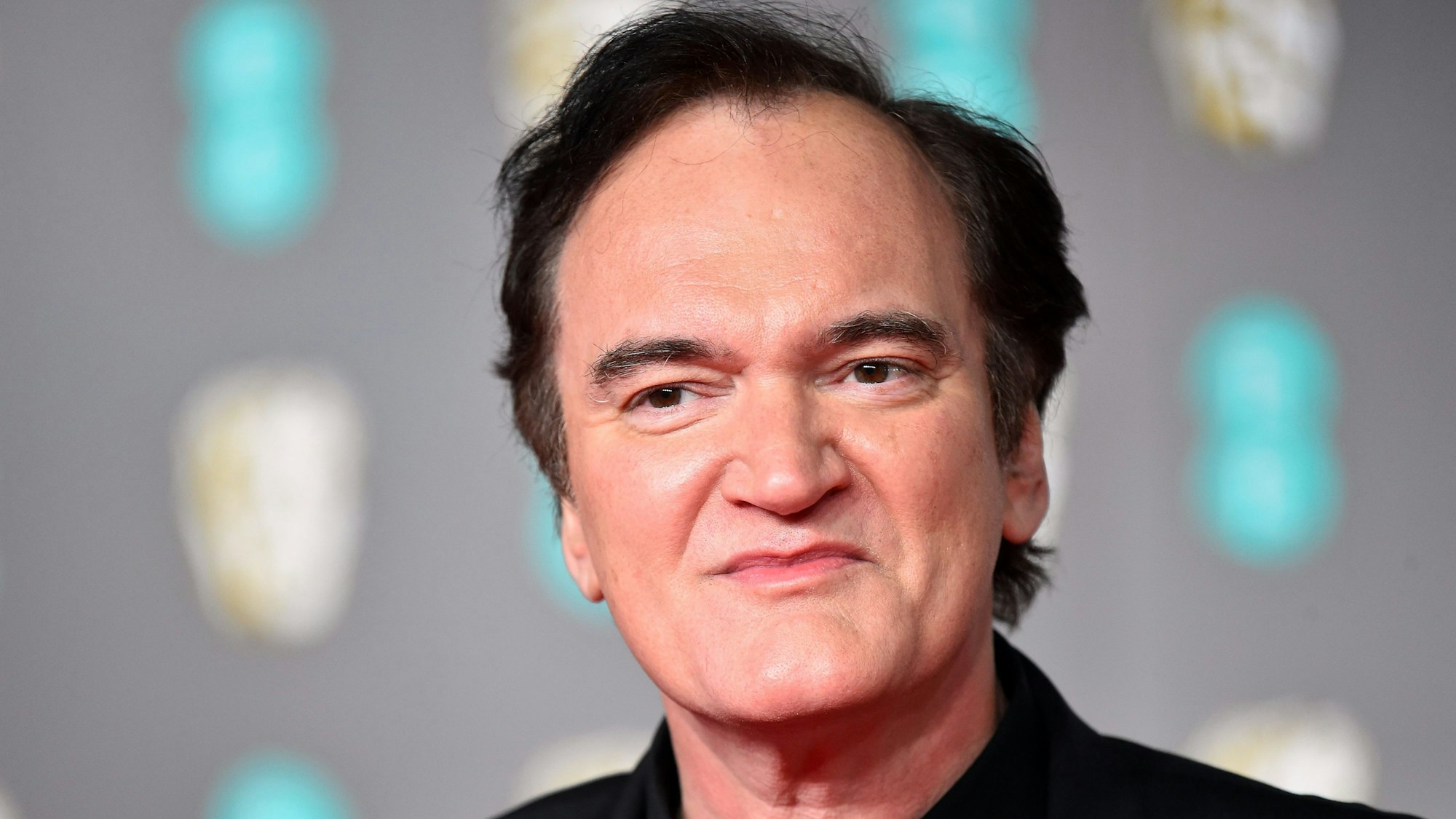 Großbritannien, London: Star-Regisseur und Oscar-Preisträger Quentin Tarantino kommt zur 73. Verleihung der British Academy Film Awards in die Royal Albert Hall.