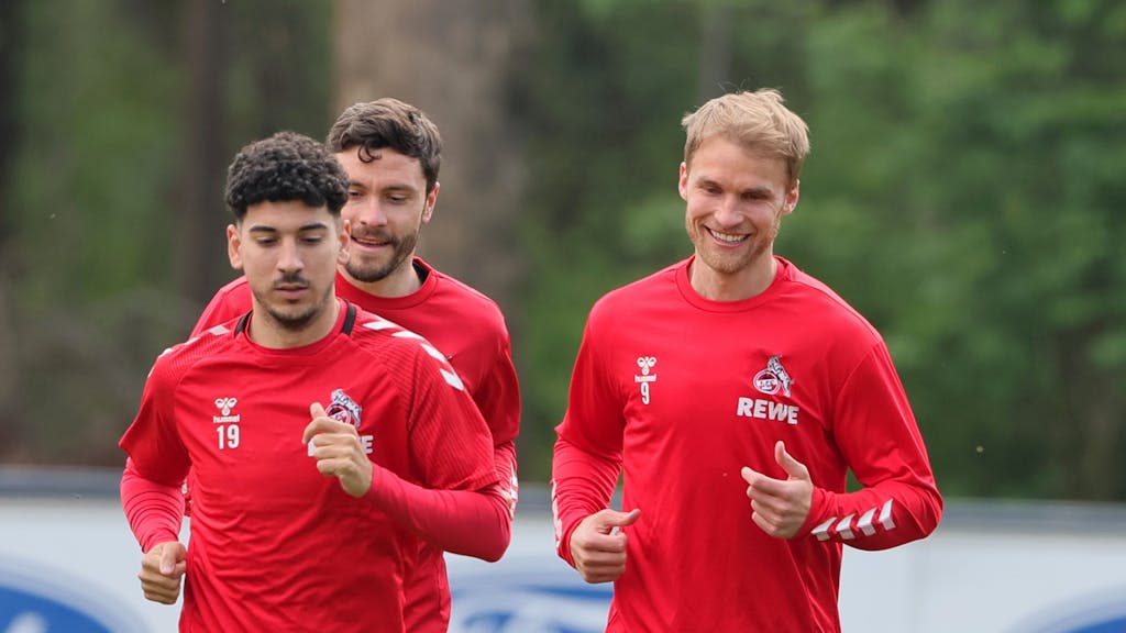 Sebastian Andersson, Jonas Hector und Dimitris Limnios scherzen im FC-Training.&nbsp;