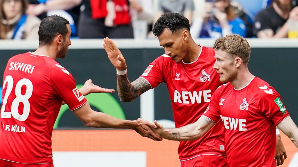 Ellyes Skhiri (l-r), Davie Selke und Florian Kainz jubeln über das Tor für den 1. FC Köln zum 2:0 bei der TSG Hoffenheim.