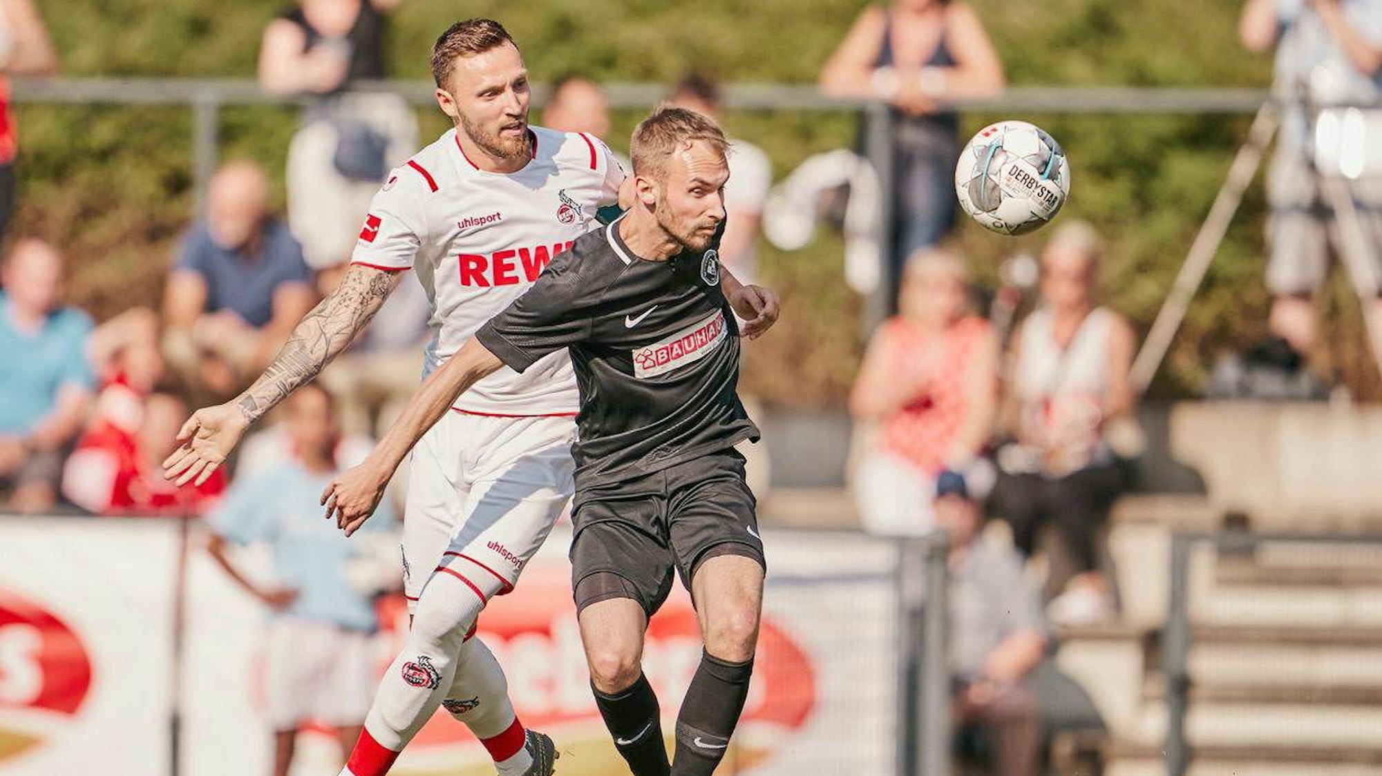 Marco Ban (r.) im Spiel seines Heimatvereins Frechen 20 gegen seinen Arbeitgeber 1. FC Köln. Foto: 1. FC Köln