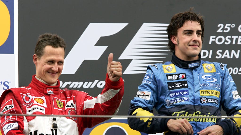 Michael Schumacher und Fernando Alonso nach dem Großen Preis von San Marino 2005.
