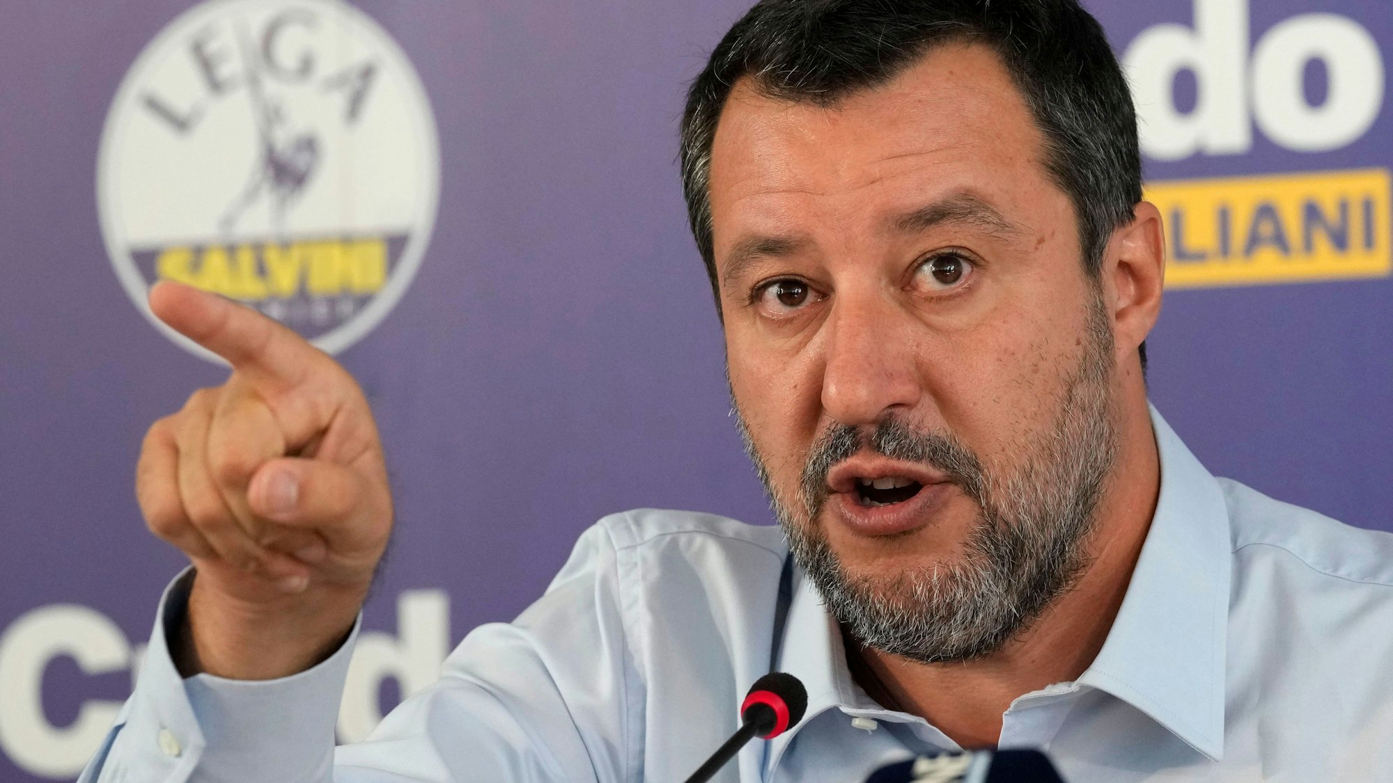 The League leader Matteo Salvini gestures during a news conference in Milan, Italy, Monday, Sept. 26, 2022. A party with neo-fascist roots, the Brothers of Italy, won the most votes in Italy's national elections, looking set to deliver the country's first far-right-led government since World War II and make its leader, Giorgia Meloni, Italy's first woman premier, near-final results showed Monday. (AP Photo/Antonio Calanni)