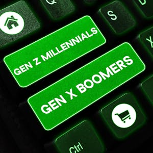 Auf einer Computertastatur sind zwei Tasten mit der Aufschrift "Gen Z Millennials" und "Gen X Boomers" belegt.&nbsp;