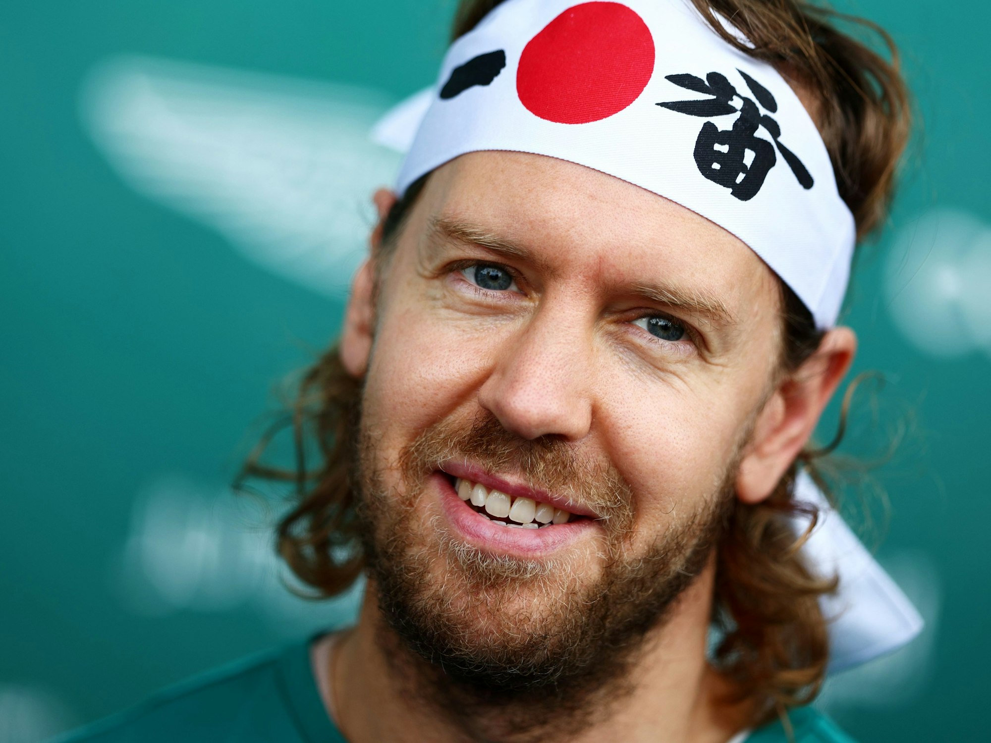 Sebastian Vettel trägt am Rande des Japan-GP ein Stirnband mit japanischer Schrift.