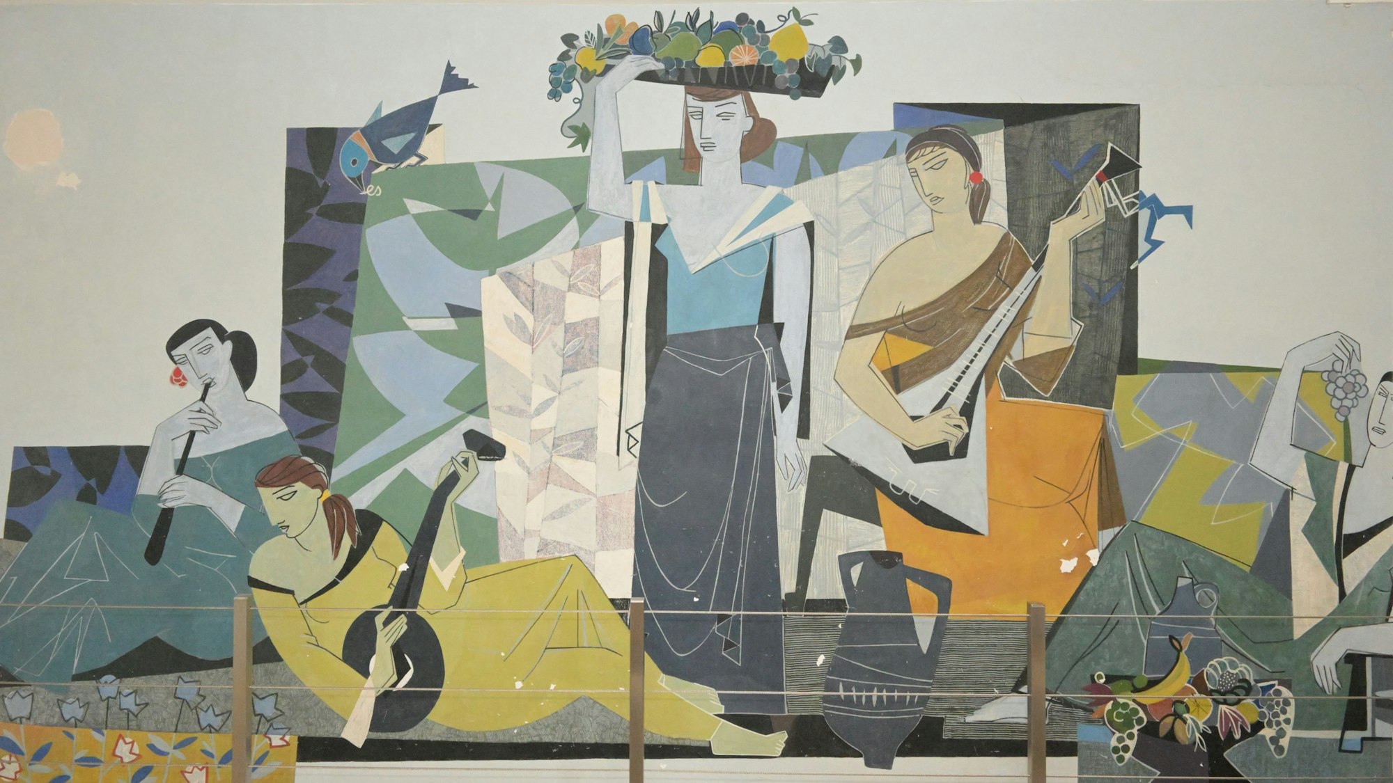 Das Wandbild Lebensfreude von Eberhard Schlotter zeigt tanzenden und musizierende Frauen.