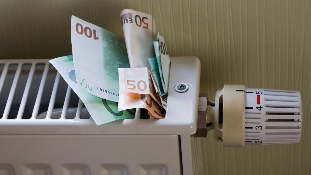 Euro banknotes stuck in a radiator