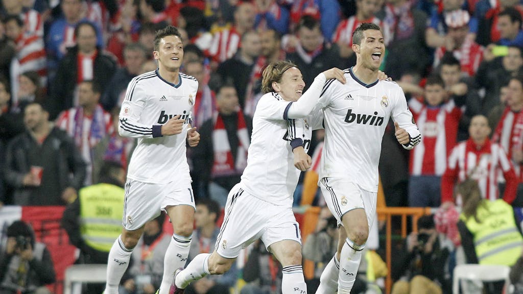 Mesut Özil. Luka Modric und Cristiano Ronaldo jubeln.