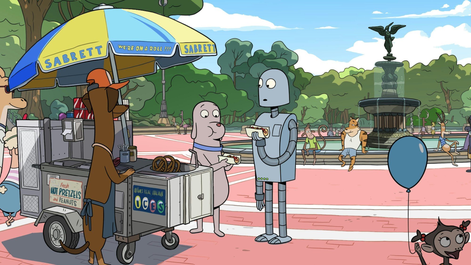 Das Bild zeigte die cartoonhafte Szene von „Robot Dreams“. Ein Hund und ein Roboter holen sich an einem Stand einen Hotdog. Im Hintergrund ein großer Brunnen und weitere vermenschlichte Tiere.