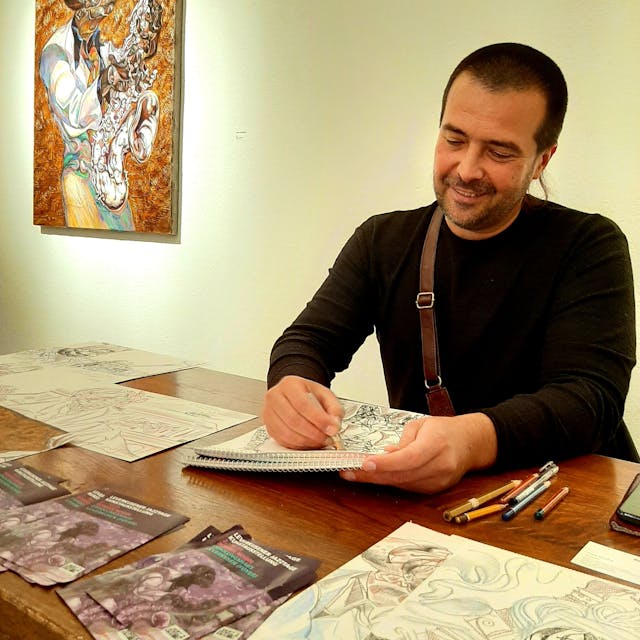 Roman Nogin ist Künstler aus der Ukraine, arbeitet unter anderem an einer Serie mit Jazz-Porträts und Bildern mit Bezug zum Jazz – und gastiert derzeit während der Leverkusener Jazztage im Erholungshaus, wo er seine Bilder ausstellt und im Foyer kkleine Zeichnungen für die Besucherinnen und Besucher anfertigt.